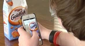 Image of person using taptapsee on a bag of cookies